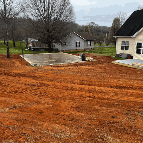 photo of cleared, reshaped back yard